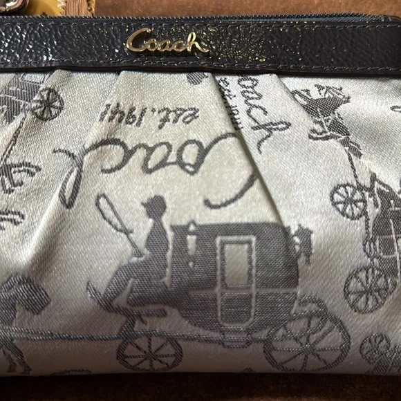Vintage COACH perfect pre-loved condition wristlet. Two-tone blue with silver.